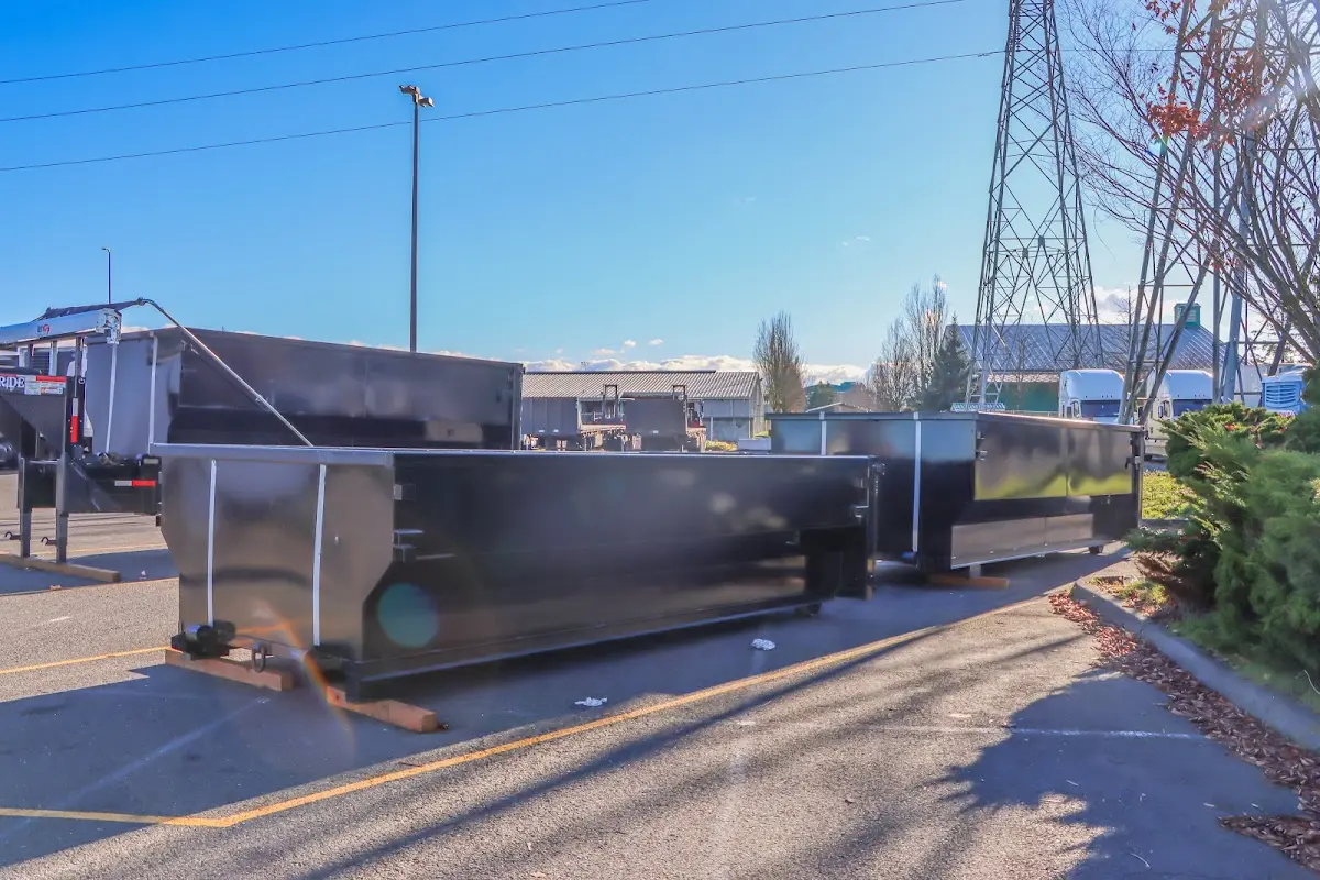 Roll-off dumpster ready for waste disposal at job site for 3 Yard Dumpster Rental in Bensville